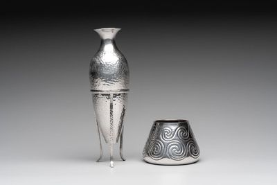 A silver amphora on stand and a Lalaounis silver vase, 925/000, Greece, 20th C.