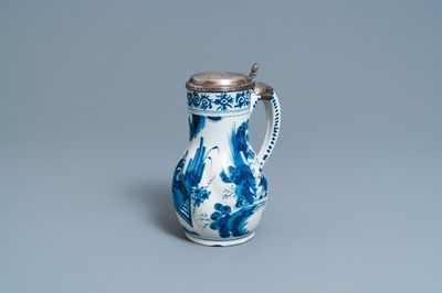 A silver-mounted Dutch Delft blue and white chinoiserie jug, 17th C.