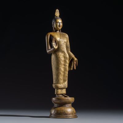 A Sinhalese gilt-copper-alloy figure of Buddha Shakyamuni, Sri Lanka, late Kandyan period, 18th C.