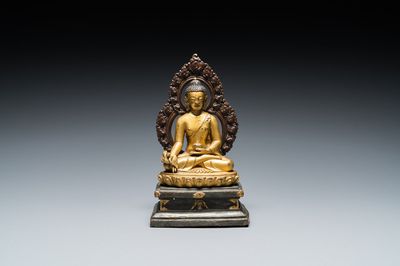 A Sino-Tibetan gilt and silvered copper alloy Medicine Buddha or Bhaishajyaguru, 19th C.