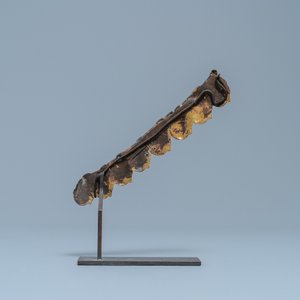 A Sino-Tibetan gilt bronze 'Buddha head' buckle fragment, 17/18th C. — 照片 2