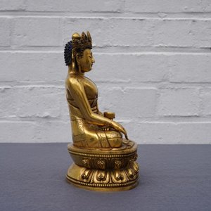 A Sino-Tibetan gilt bronze figure of Buddha Shakyamuni, 17/18th C. — 照片 25