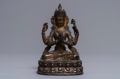 A Sino-Tibetan gilt bronze figure of the four-armed Avalokiteshvara, 18th C.