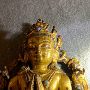 A Sino-Tibetan inlaid gilt bronze figure of Buddha, Ming — photo 26