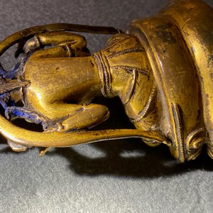 A Sino-Tibetan inlaid gilt bronze figure of Buddha, Ming — photo 32