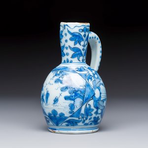 A small blue and white Dutch Delft chinoiserie ewer with figural and floral design — photo 1