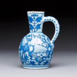 A small blue and white Dutch Delft chinoiserie ewer with figural and floral design — photo 2