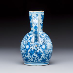 A small blue and white Dutch Delft chinoiserie ewer with figural and floral design — photo 3