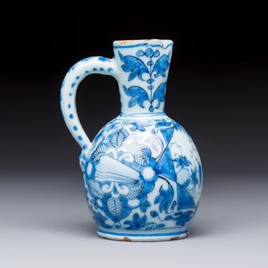 A small blue and white Dutch Delft chinoiserie ewer with figural and floral design — photo 4