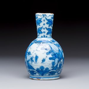 A small blue and white Dutch Delft chinoiserie ewer with figural and floral design — photo 5