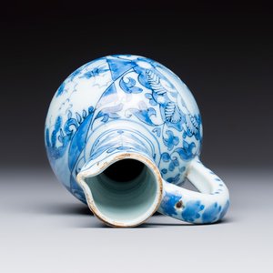 A small blue and white Dutch Delft chinoiserie ewer with figural and floral design — photo 6