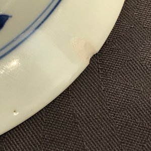A small Chinese blue and white plate with a monk near the water, Transitional period — photo 11