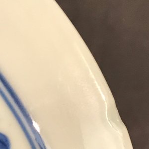 A small Chinese blue and white plate with a monk near the water, Transitional period — photo 13