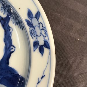 A small Chinese blue and white plate with a monk near the water, Transitional period — photo 5