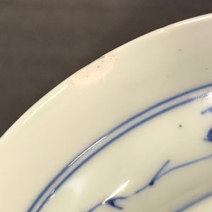 A small Chinese blue and white plate with a monk near the water, Transitional period — photo 8