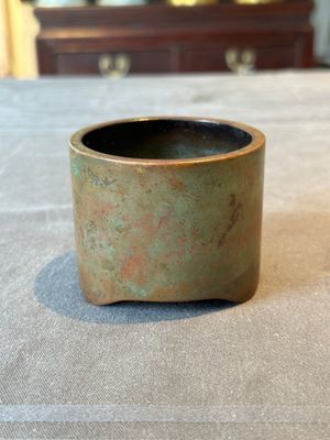A small Chinese bronze cylindric tripod censer, Xuande mark, Ming — photo 1