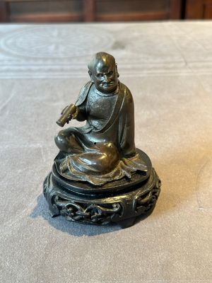 A small Chinese bronze figure of a Luohan, Ming — photo 1