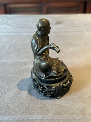 A small Chinese bronze figure of a Luohan, Ming — photo 4
