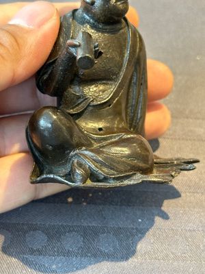 A small Chinese bronze figure of a Luohan, Ming — photo 10