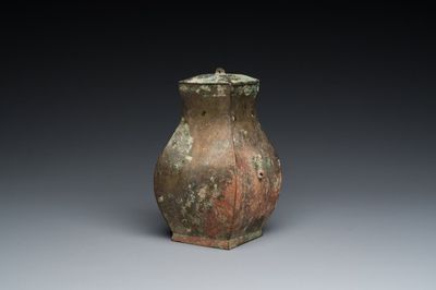 A small Chinese bronze ritual 'fang hu' vessel and cover, Warring States Period