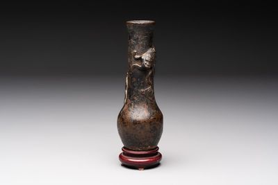 A small Chinese bronze vase with a chilong on a wooden stand, Yuan