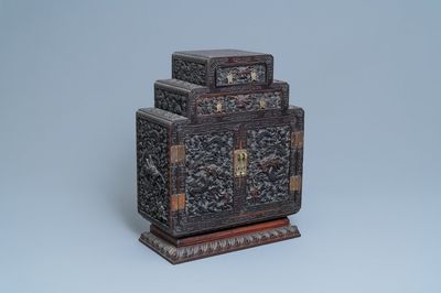 A small Chinese carved wooden 'dragon' cabinet, Republic