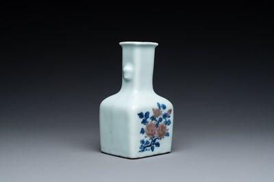 A small Chinese celadon-ground blue, white and copper-red bottle vase, Qianlong mark and of the period
