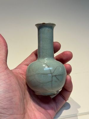 A small Chinese Guan-type Longquan celadon bottle vase, Song/Yuan — photo 2