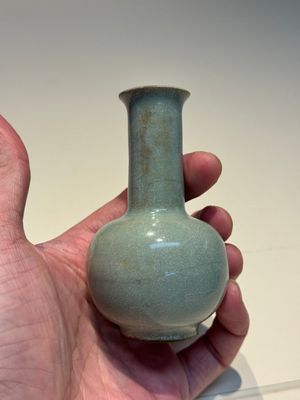 A small Chinese Guan-type Longquan celadon bottle vase, Song/Yuan — photo 4