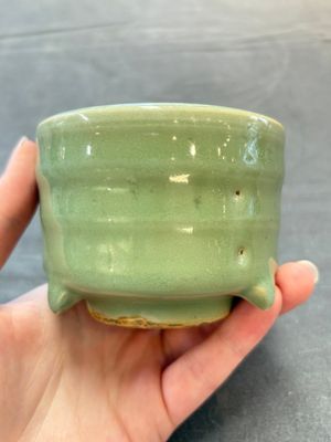 A small Chinese Longquan celadon cylindrical tripod censer, Ming — photo 3