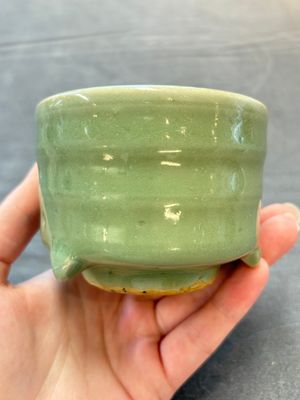 A small Chinese Longquan celadon cylindrical tripod censer, Ming — photo 4
