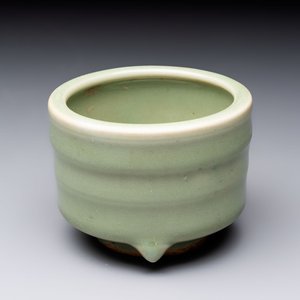 A small Chinese Longquan celadon cylindrical tripod censer, Ming — photo 1