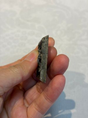 A small Chinese metal-alloy square mirror with relief design, Tang — photo 2