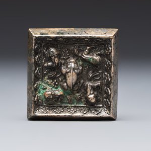 A small Chinese metal-alloy square mirror with relief design, Tang — photo 1