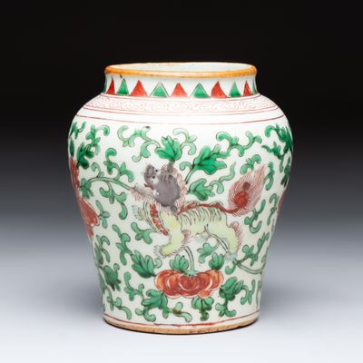 A small Chinese wucai 'Buddhist Lions and Peony Scrolls' jar, Transitional period, Transitional period