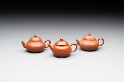 A small Chinese Yixing stoneware covered teapot and two Swatow Yixing-style covered teapots, Yixing Hui Mengchen 宜興惠孟臣製 and Shunji 順記 marks, 19/20th C.