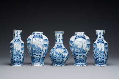 A small Dutch Delft blue and white garniture of five vases, 18th C.