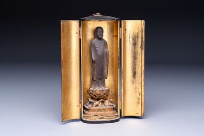A small Japanese gilt-lacquered wooden zushi shrine with a carved wooden monk, probably Edo, 18/19th C.