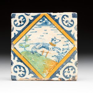 A small polychrome Dutch Delft maiolica 'dog' diamond tile, late 16th C. — photo 1