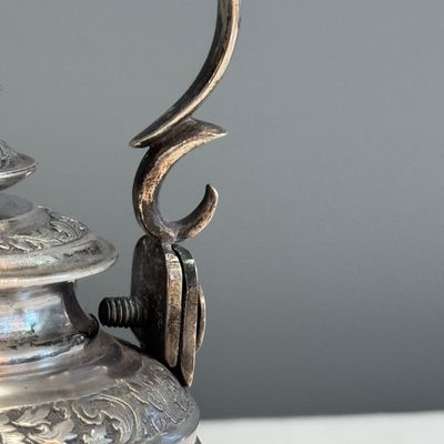 A South-East Asian repoussé silver teapot and a covered box — photo 4
