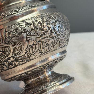 A South-East Asian repoussé silver teapot and a covered box — photo 6