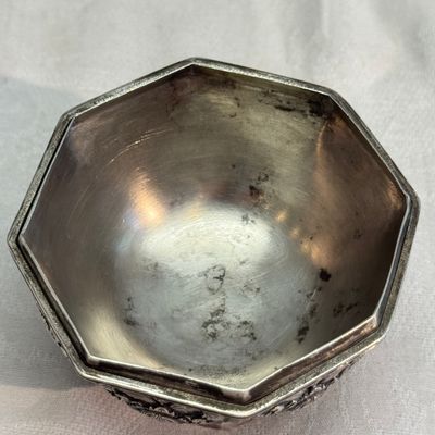 A South-East Asian repoussé silver teapot and a covered box — photo 32