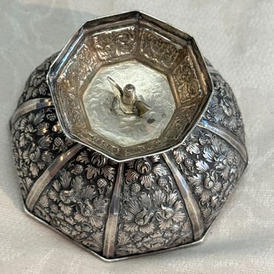 A South-East Asian repoussé silver teapot and a covered box — photo 33