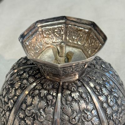 A South-East Asian repoussé silver teapot and a covered box — photo 34