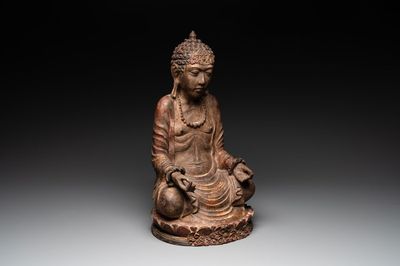 A Southeast Asian gilt-lacquered wooden sculpture of a praying ascetic, 18/19th C.