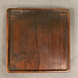 A square Chinese inscribed wood-encased duan inkstone, 19/20th C. — photo 22