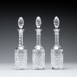 A sterling silver tantalus with three crystal-cut bottles and stoppers, 19/20th C. — photo 8