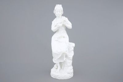 A tall biscuit figure of a country girl, signed G. Lévy, 19/20th C.
