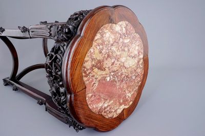 A tall Chinese carved wood stand with marble inset, 19th C.