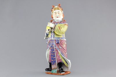 A tall Chinese famille rose porcelain figure of a dignitary, 19th C.